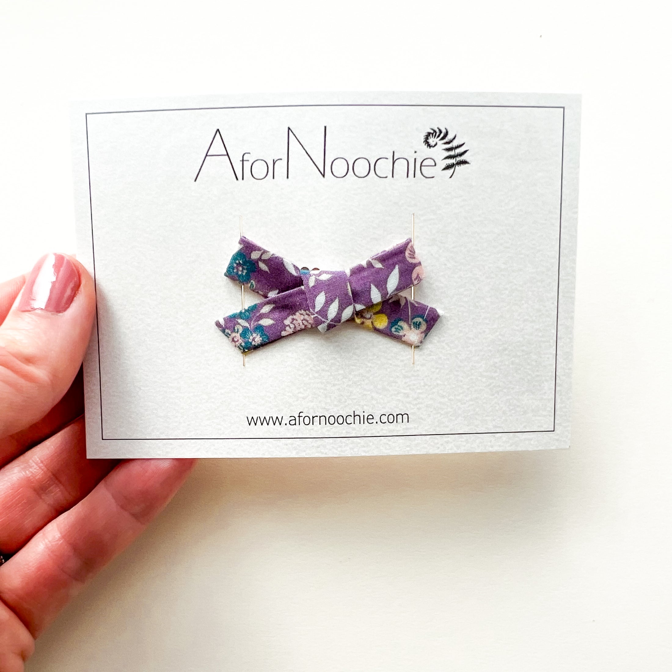 Mini bow hair clips in Liberty of London prints.