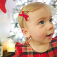 Load image into Gallery viewer, Christmas mini velvet baby hair bow clips designed to latch on fine hair. Stocking filler for baby girls
