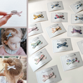 Load image into Gallery viewer, Regular bow hair clips in Liberty of London prints
