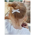 Load image into Gallery viewer, Regular bow hair clips in Liberty of London prints - A for Noochie 
